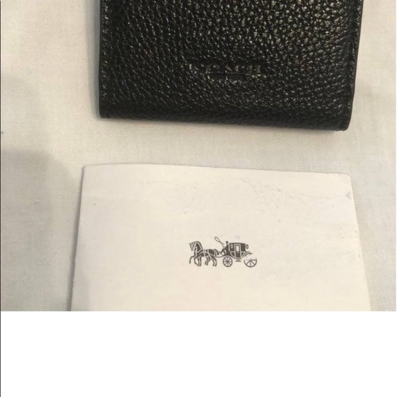 New Coach Earbud Case